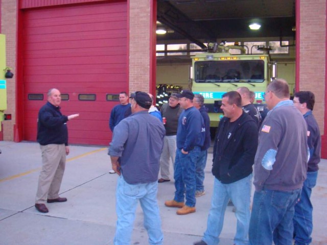 Chief Lee Gillette speaks to the Ever-Ready's, during their visit to Long Island MacArthur Airport Fire Rescue.